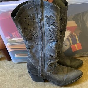 Santana (musician) collaboration with Macy’s cowboy boots. Grey leather.